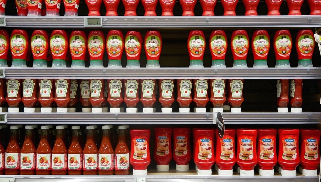 ketchup bottles on shelf