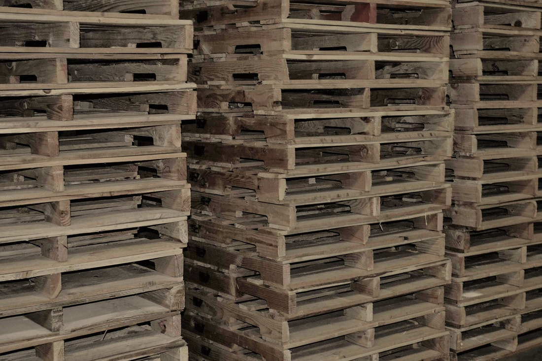 stacks of wooden pallets